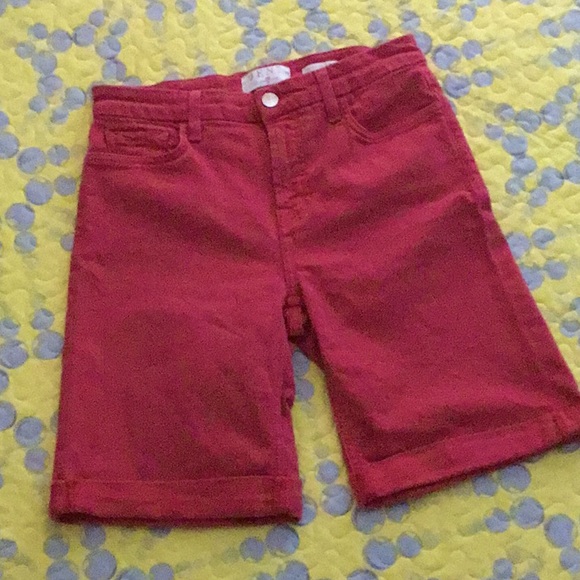 JEN7 stretch Bermuda shorts in a washed/weathered orange shade. - Picture 1 of 5
